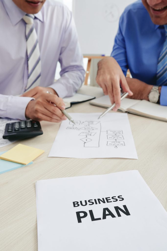 businessmen-creating-a-strategic-business-plan